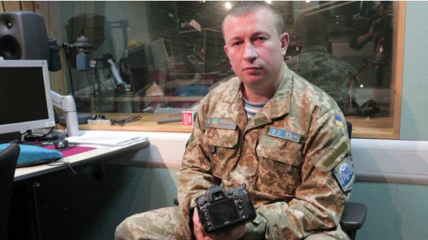 Руслан Боровик с фотоаппаратом