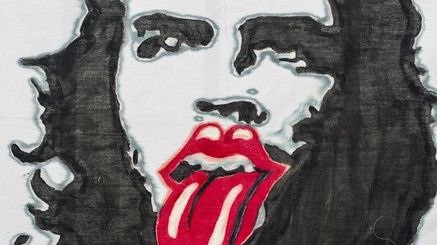 Imagen del Che Guevara con la boca símbolo de los Rolling Stones.