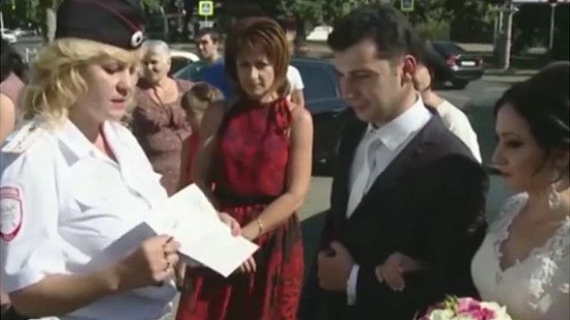 150906085313_russia_wedding_police_640x360_bbc_nocredit.jpg