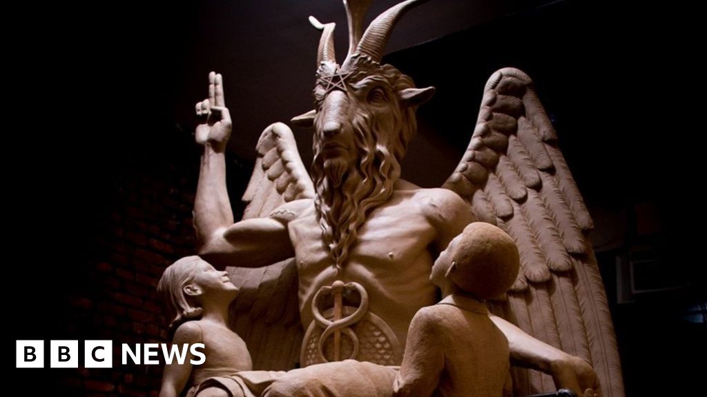 Decoding the symbols on Satan's statue BBC News