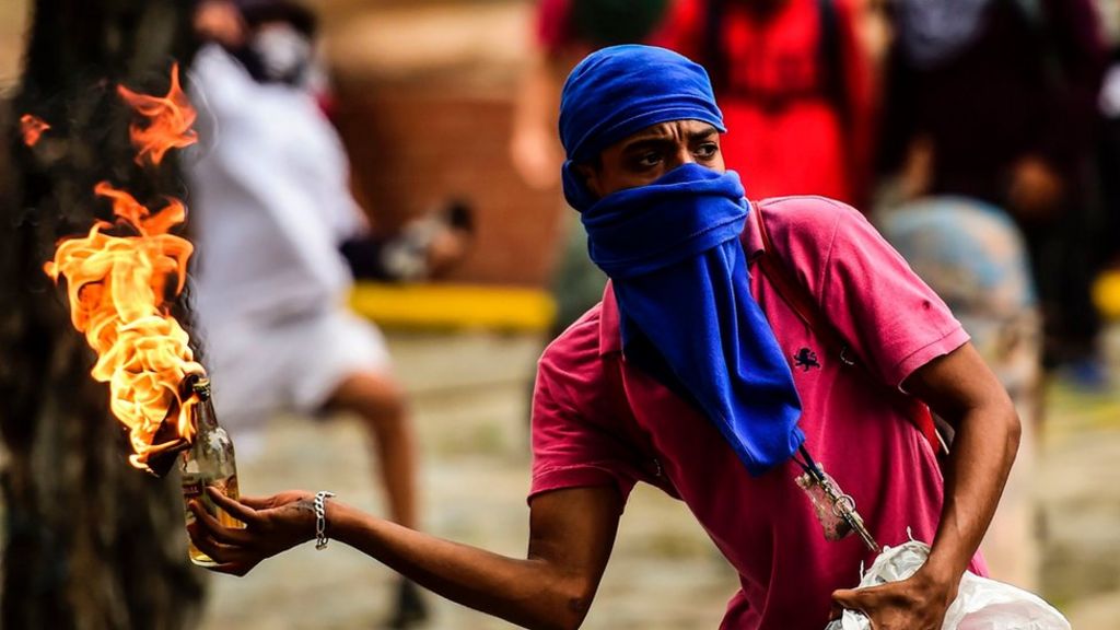 Venezuela crisis: Deadly clashes as millions join strike
