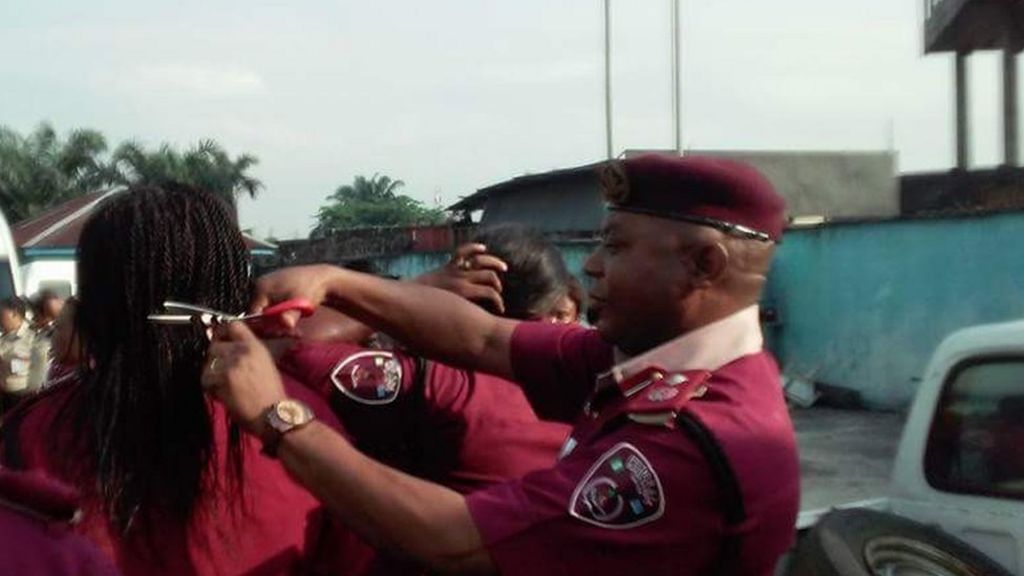 Nigeria road safety commander cut hair of female employees