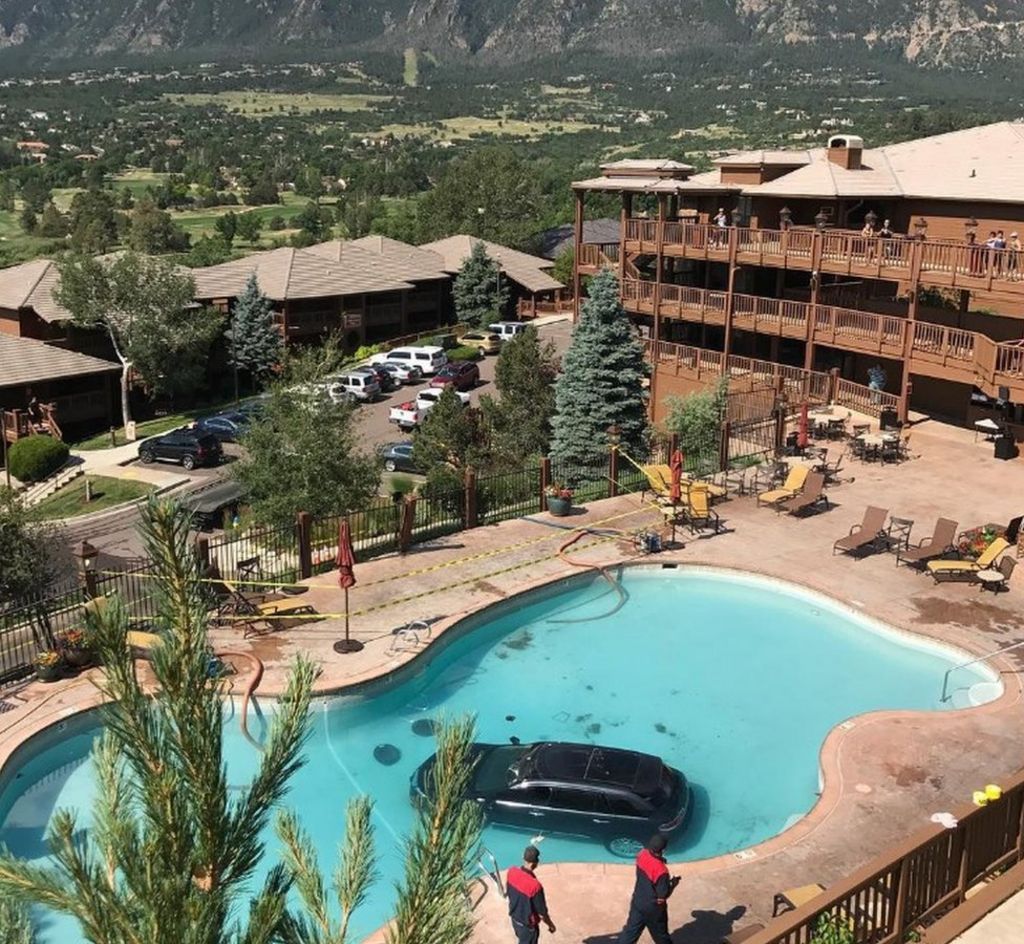 Car plunges into Colorado Springs swimming pool