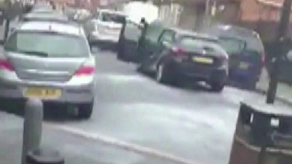 A car reverses into a building during 'attempted raid'