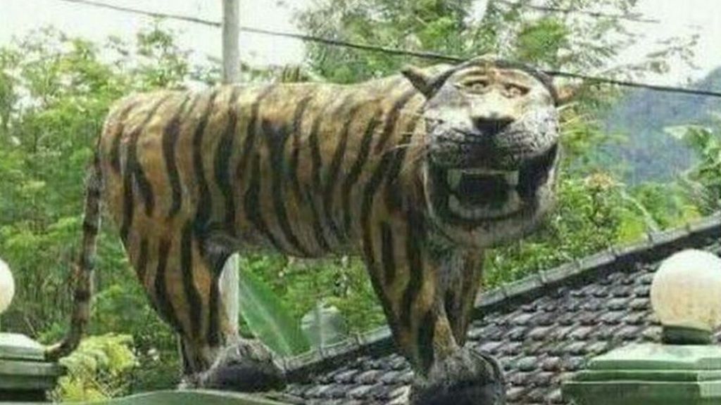Indonesian army destroys muchmocked tiger statue BBC News