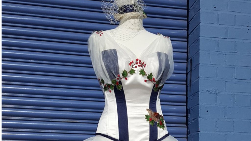 Bride weds in West Bromwich Albion-themed dress