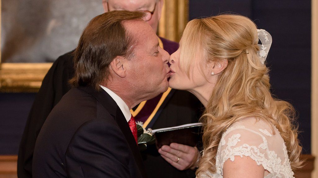 Trump's 100 Days: Newlyweds split over president's performance