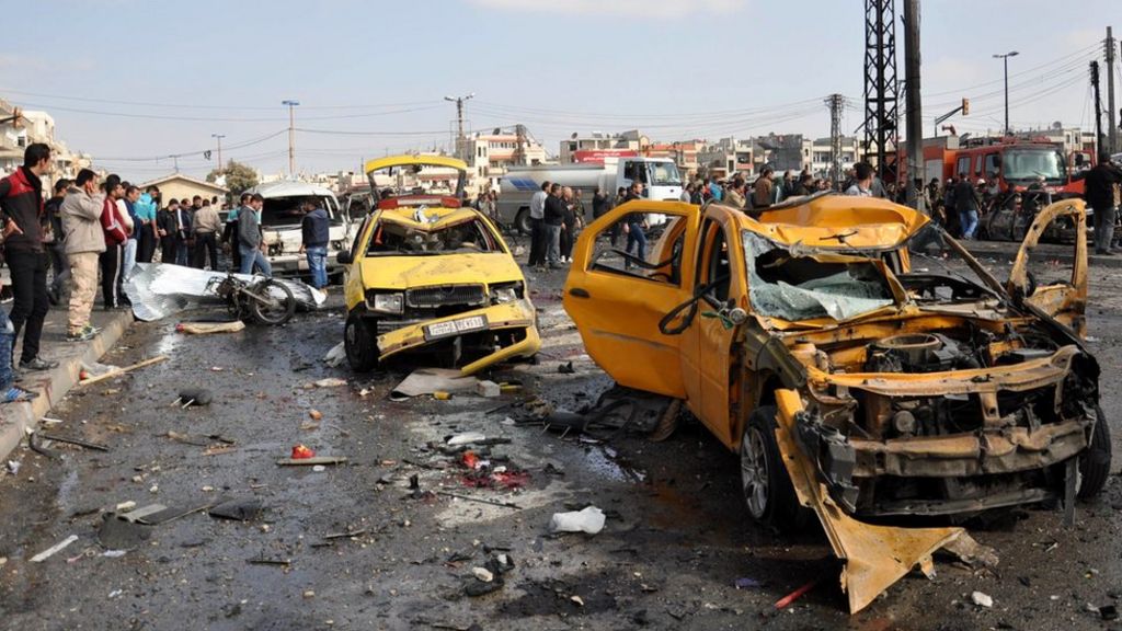 Syria conflict: Homs and Damascus bomb blasts kill 140 - BBC News