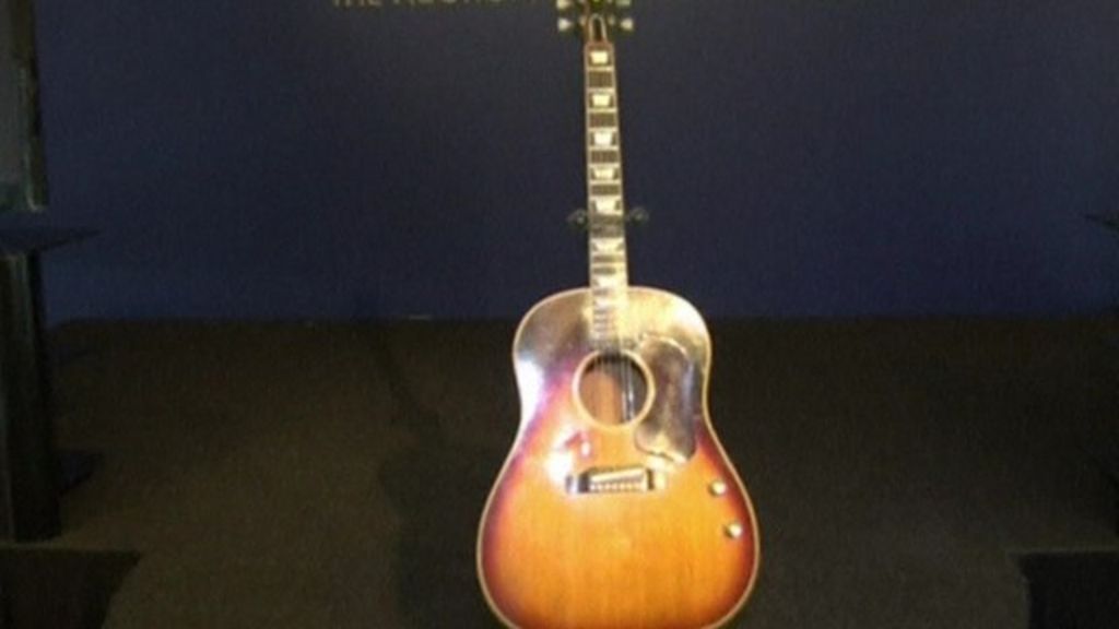 John Lennon's acoustic guitar sells at auction for 2.4m BBC News
