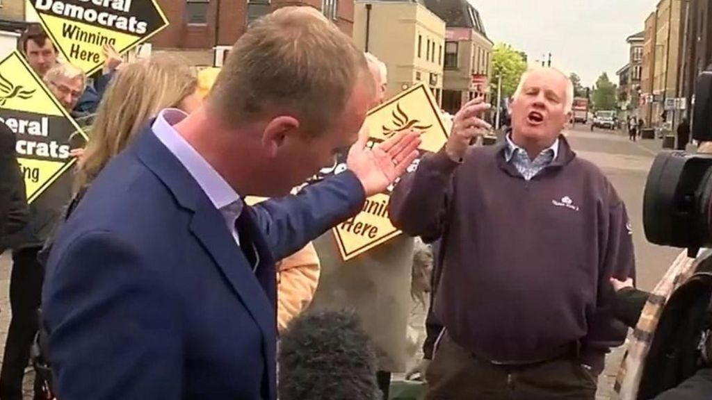 Lib Dem leader Tim Farron challenged by member of public
