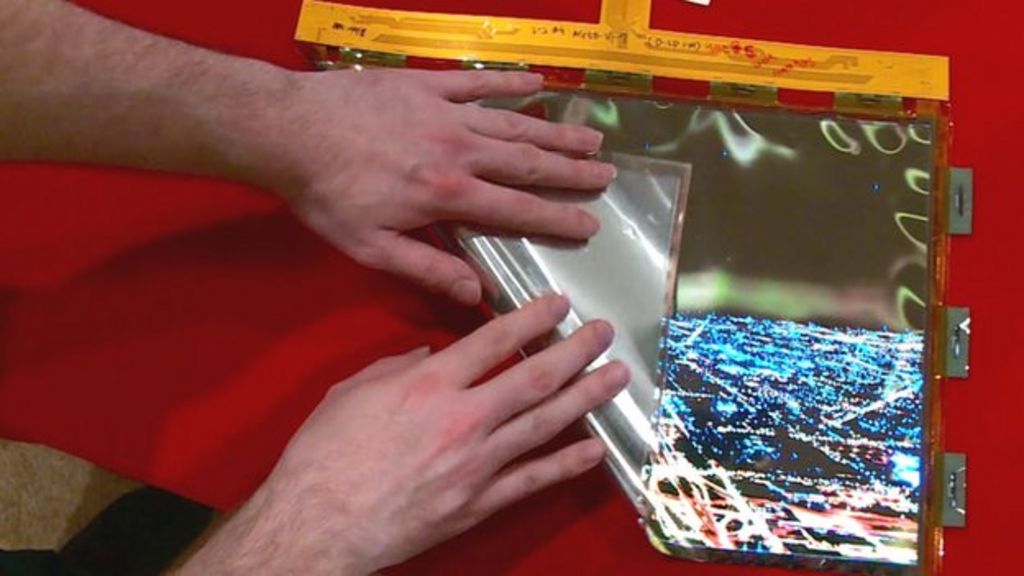 CES 2016: Hands-on with LG's roll-up flexible screen - BBC News