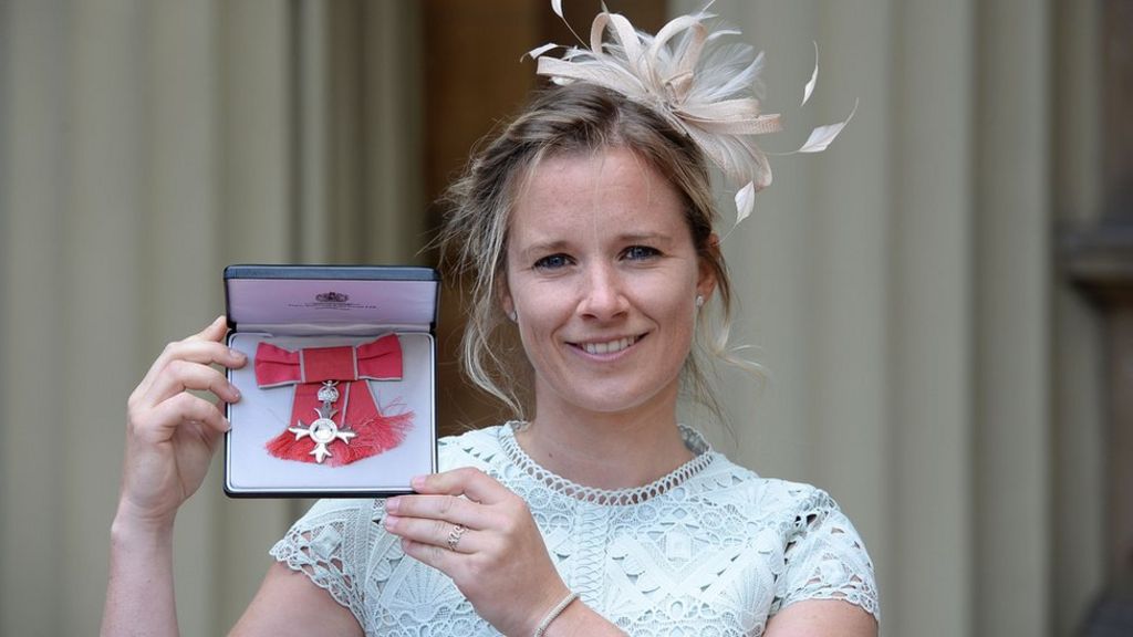 Olympic sailor Hannah Mills gets MBE at Buckingham Palace