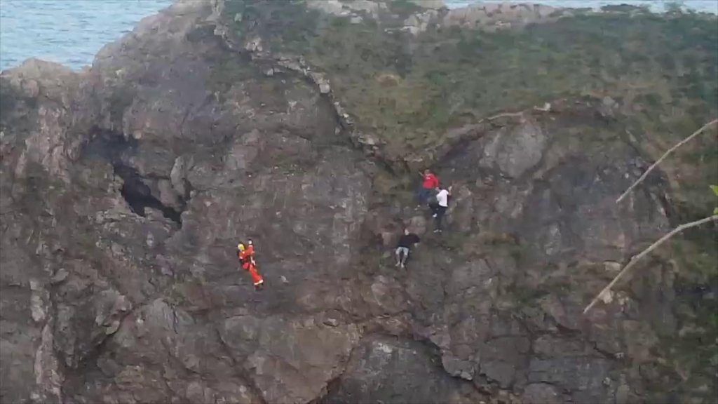 Dorset cliff rescue: Video shows three people plucked to safety