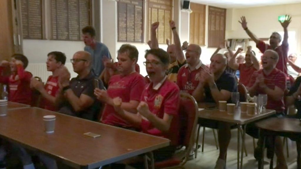 Welsh fans celebrate Lions penalty kick for draw