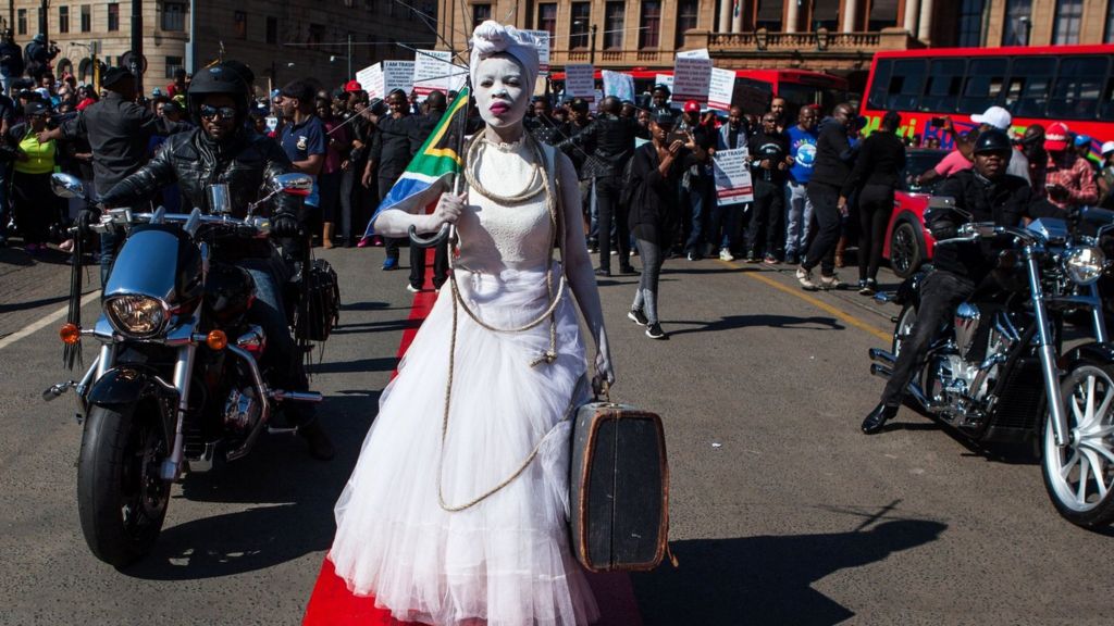 South African men march against abuse of women and children