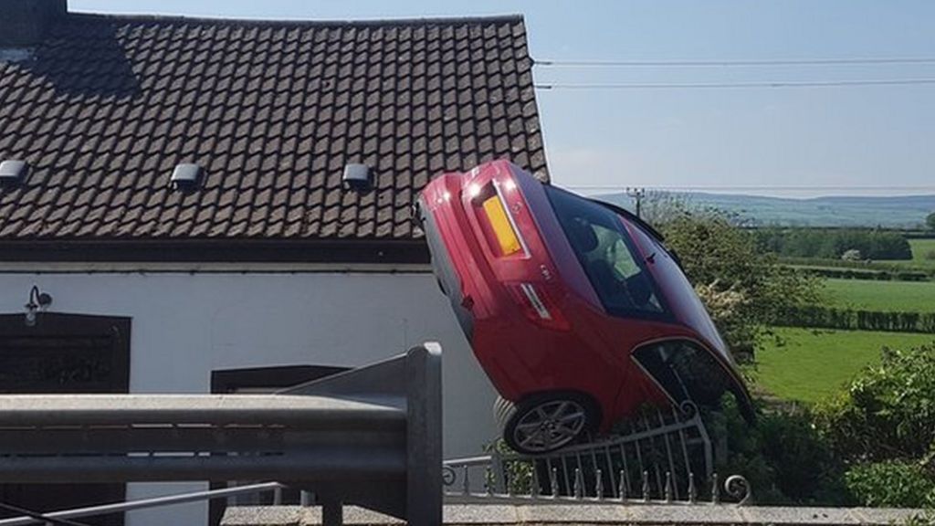 Car upended in Strabane road crash