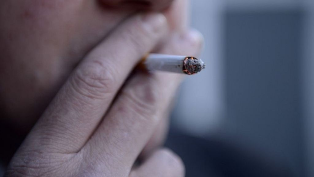 Cigarettes sold in plain green packs under new rules