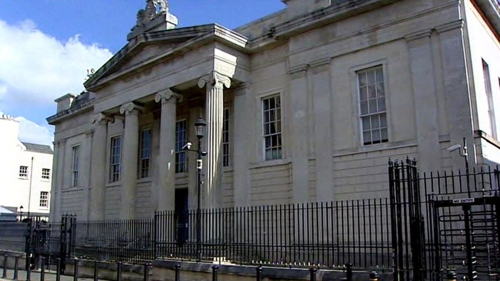Four in court over police raids on organised crime