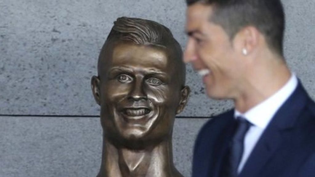 Bizarre Ronaldo statue overshadows airport naming event