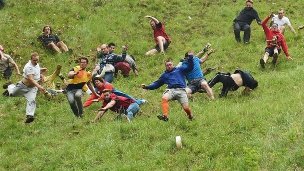 Cheeserolling spectators gather for Cooper's Hill tradition BBC News