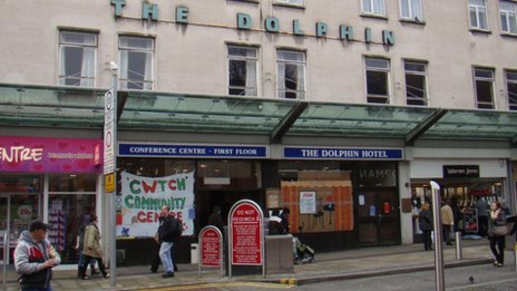 Cwtch community group occupies Swansea's empty Dolphin Hotel - BBC News