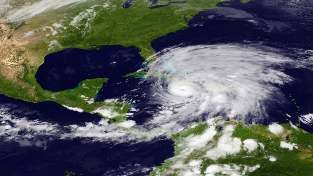 Sandy hits Cuba as category two hurricane - BBC News