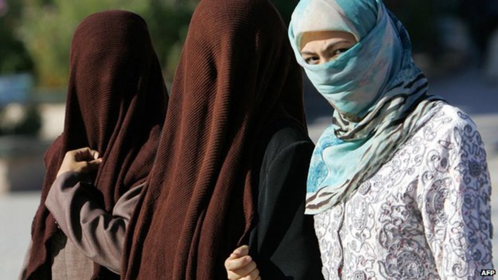 China Uighurs: Xinjiang city of Urumqi to ban Islamic veil 