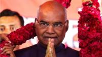 Supporters of Ram Nath Kovind, nominated presidential candidate of Indiaâ€™s ruling Bharatiya Janata Party (BJP), present him with a garland during a welcoming ceremony as part of his nation-wide tour, in Ahmedabad, India, July 15, 2017