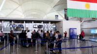 Passengers at Irbil international airport, Iraq, on 29 September 2017
