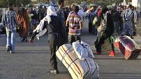 Ethiopian immigrants returning from Saudi Arabia arrive at Addis Ababas Bole International Airport on December 10, 2013.