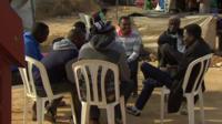 Group of men sitting