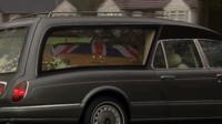 Eric Bristow's funeral cortege arrives.