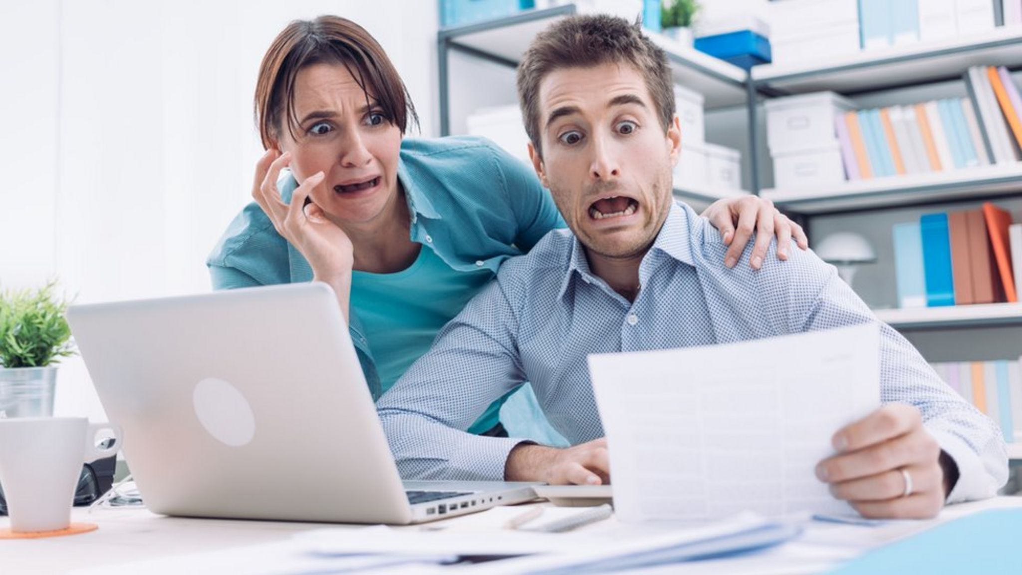 Panicking couple in office