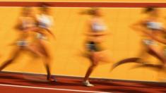 Female athletes competing on the track