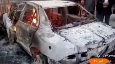 Burning car in Tuyserkan, Iran, on 31 December