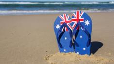 Australian flag sandals on a beach