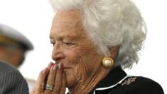 Former first lady Barbara Bush listens to remarks during the christening ceremony of the USS George HW Bush