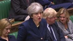 Theresa May addressing MP