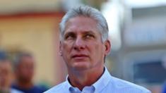 In this file picture taken on March 11, 2018 Cuba"s First Vice-President Miguel Diaz-Canel queues at a polling station in Santa Clara, Cuba,