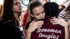Students from Marjory Stoneman Douglas High School attend a memorial following a school shooting incident in Parkland, Florida