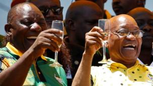 African National Congress (ANC) President Cyril Ramaphosa (L) celebrates the Congress" 106th anniversary celebrations with Kenyan President Uhuru Kenyatta (R) and president of South Africa Jacob Zuma, in East London, South Africa, January 13, 2018.