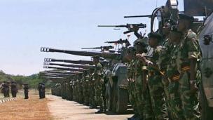 A grand parade of the Zimbabwe defence forces in Harare to mark the withdrawal of the country's troops from a four-year tour of duty from the Democratic Republic of Congo (30 November 2002)