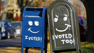 Two painted mailboxes in Denver, Colorado, in 2012