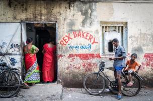 Women queuing up to place their bread orders the day before Diwali in Mumbai