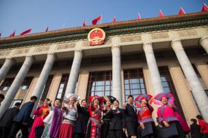 Chinese minority delegates wearing traditional costumes arrive for the closing ceremony of the 19th National Congress of the Communist Party of China (CPC) at the Great Hall of the People (GHOP) in Beijing, China, 24 October 2017