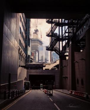 Towers seen at the end of a street