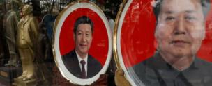 Memorable memories with images of Chinese late chairman Mao Zedong and Chinese President Xi Jinping are seen at a shop during the 19th National Congress of the Communist Party of China, in Beijing, China 21 October 2017.