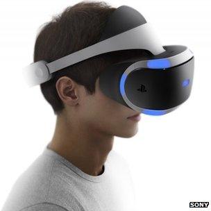 Young man wearing a virtual reality helmet.