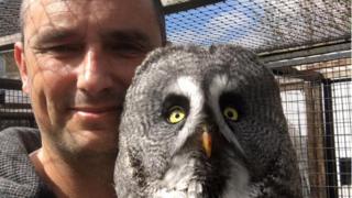 Jason Ashcroft with his great grey owl