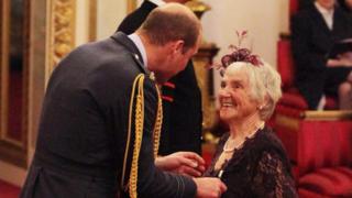 Myrtle Simpson receives the Polar Medal from Prince William